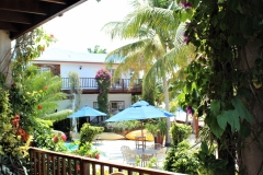 Where the swimming pools are nestled in Lush gardens mingling with 400 feet of private beach - Chabil Mar Belize Resort