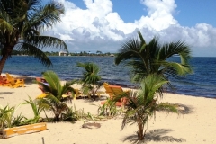 Placencia Village - "Barefoot Perfect" - Chabil Mar's Blue Roofs in the Background