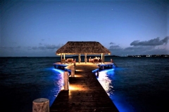 Evening Dinners by Reservation on our Underlit Pier over the Caribbean