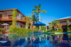 View from the Palm Tree Pool toward the Villas, each with their own sea-facing veranda!